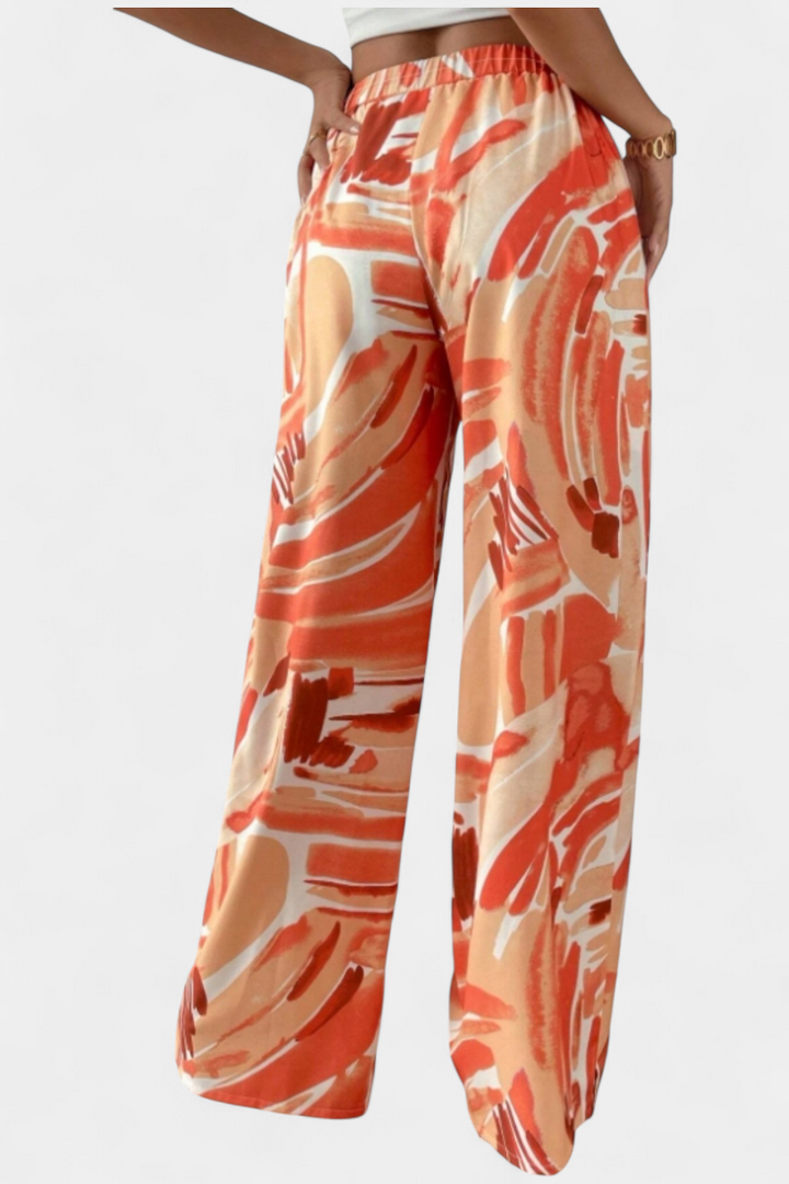 Lia - Pantalone z širokim krojem z abstraktnim potiskom